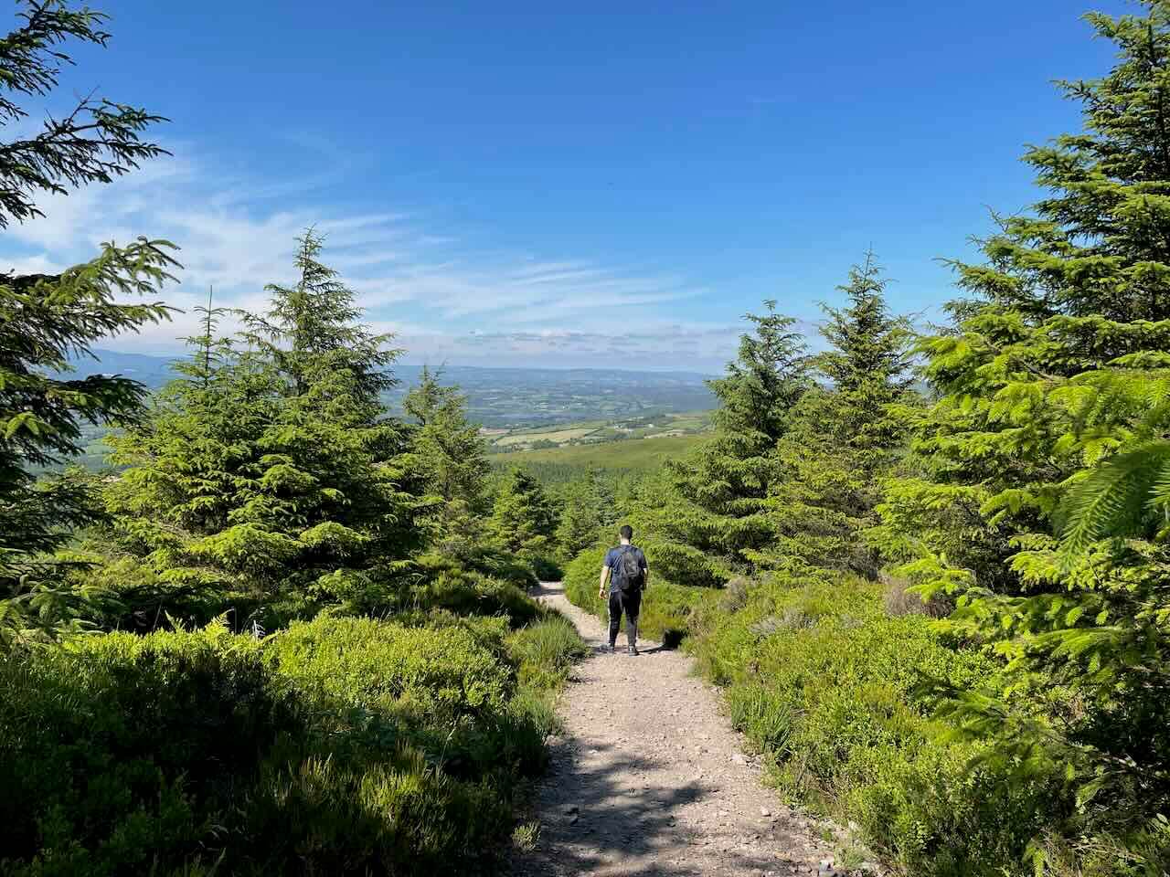 Man hiking in a hill